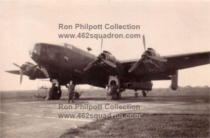 Ronald Bruce Philpott RAAF 433023 of 462 Squadron, beside an unidentified Halifax III at Foulsham, 1945